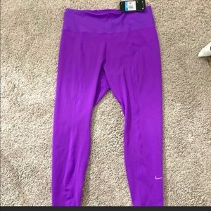 Nike | The nike one luxe tight fit mid rise purple crop length dri fit leggings